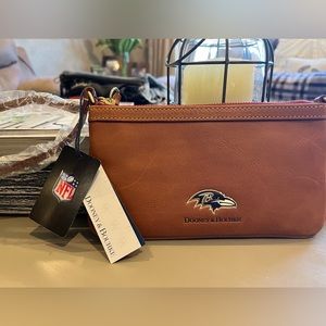 Brand new Dooney & Burke Ravens Wristlet.